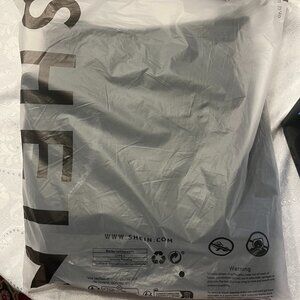 NEW Black ripped jeans